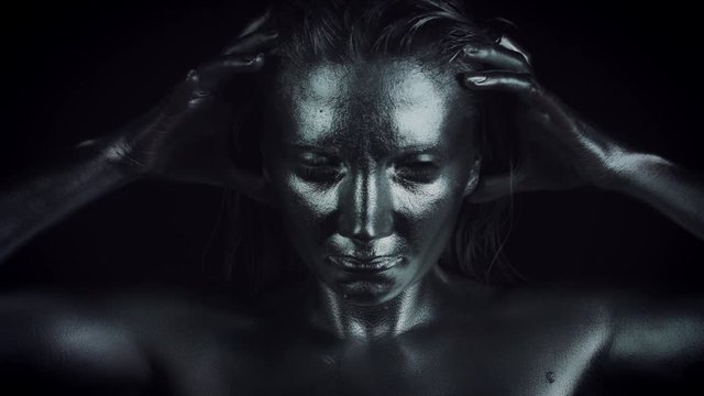 4K Horror Woman with Silver Metallic Make-up, zoom in to Face