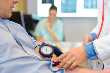 taking blood pressure