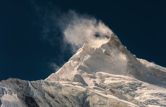 Wind Blowing Snow From Mountain Peak