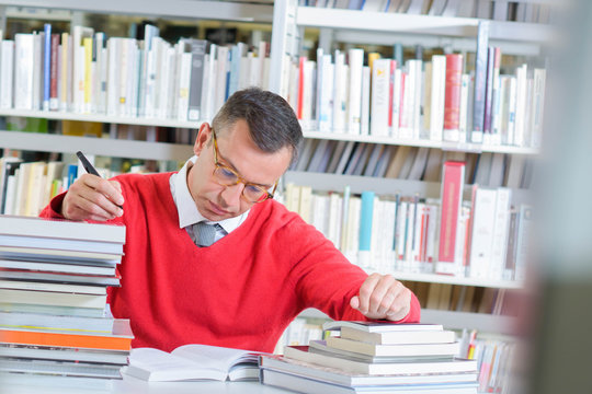 busy reader in the library