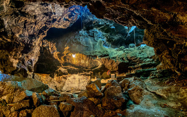 Beautiful view of cave wall in cave passage, showing detail of the rock texture, illuminated by lamp,  Captured from Lawa cave, Purbalingga, Indonesia.