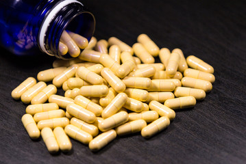 Medication and pills on a black background 