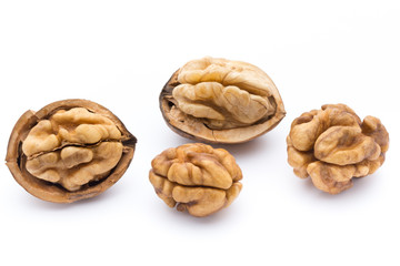 Walnut and walnut kernel isolated on the white background.