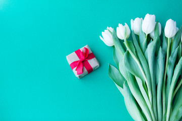 White tulips bouquet and gift box