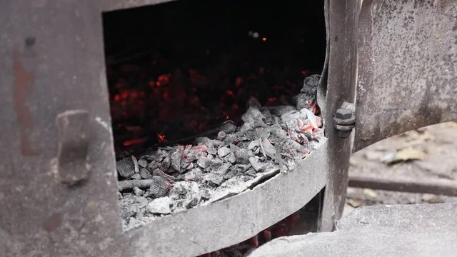 Rakija prepare boiler fire in slow motion distilled process procedure 1080p FullHD footage - Tree logs in metal tube burning as part of making Serbian alcoholic hard liquor beverage 1920X1080 HD 