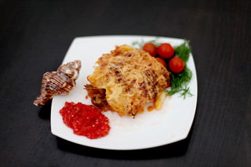 Pork with cheese and tomatoes. Dinner for the family