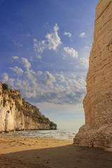 Gargano coast: bay of Vieste,(Apulia) ITALY.Castello or Scialara beach:it is overshadowed by the Swabiam Castle and the Pizzomunno Monolith (from the local dialect: peak of cape of the world).