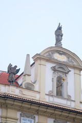 Obraz premium Prague, Czechia - November, 21, 2016: monument on a building in a center of Prague, Czechia