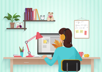 Pretty female designer working with colors at home. Young woman working in office, sitting at desk, using computer laptop with graphic interface.