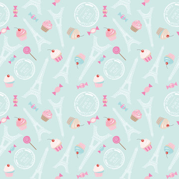 Cute seamless pattern background with Eiffel tower, cupcakes and sweets on pastel blue. For web page design, notebook cover, wrapping or scrapbook paper. Vector EPS10.
