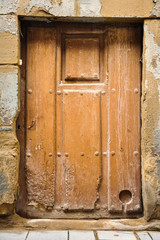 Village door with catflap, Santo Domingo de la Calzada, La Rioja, Spain