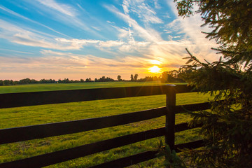 Fototapeta premium Dramatic sunset sky on countryside.