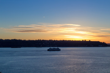 Boat on a winter sunset at Seattle waterfront