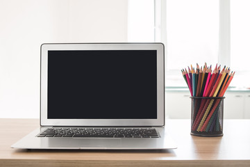 Laptop at the desk