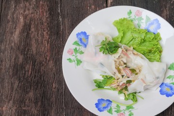 Closeup Fresh Spring Roll  with vegetable and coriander in plate