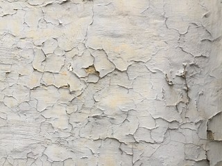 Cracked white wall background texture