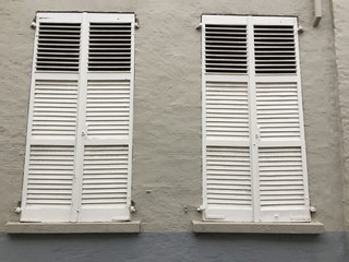 White twin window and old gray wall background