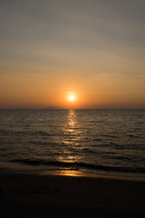 Fototapeta na wymiar Sunset on the beach.