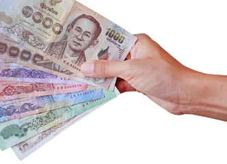 Hand holding thai money isolated on white background