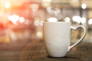 Double exposure of coffee cup with clock face