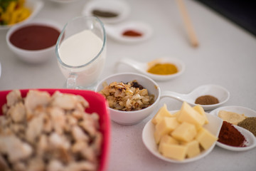 Preparing food in modern white kitchen