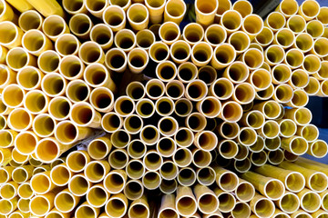 Yellow PVC pipes stacked