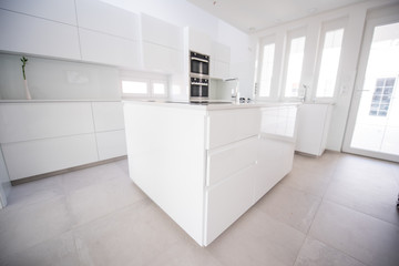 Fototapeta na wymiar Modern white kitchen