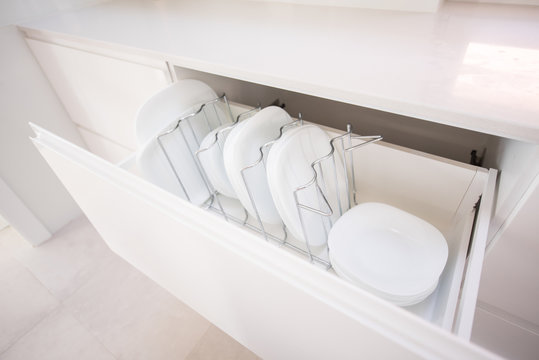 Plates In A Kitchen Drawer