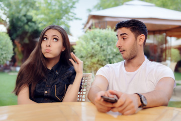 Couple Arguing on a Date at a Restaurant