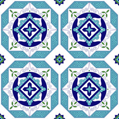 Spanish pattern from blue, green and white tiles ornaments. Portuguese azulejo, mexican, moroccan, greek or arabic motifs. Background for wallpaper, surface texture, wrapping or fabric.
