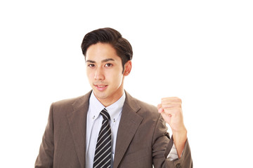 ガッツポーズのビジネスマン
