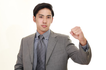 ガッツポーズのビジネスマン