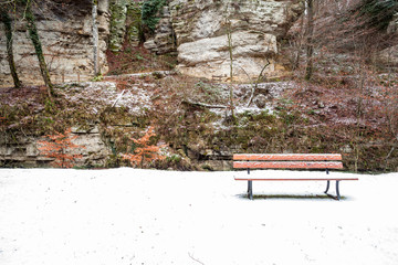 an Bench in snow