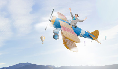 Woman in drawn airplane . Mixed media