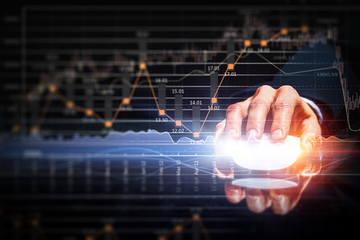 Businessman using mouse . Mixed media