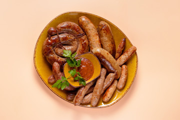 Set of fried sausages