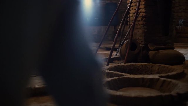 panoramic view of underground cellar for storing georgian wine in kvevri