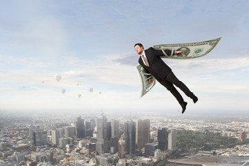 Business concept money is freedom . Mixed media © Sergey Nivens