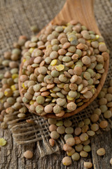 lentils on wooden surface
