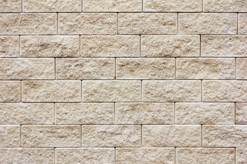 White bricks in layers as a cladding of a wall