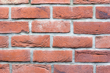Obraz premium Red bricks in layers as a cladding of a wall