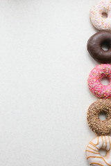 colored donuts on a light background