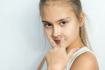 Young girl posing on white background isolated