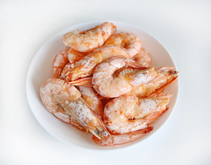 Baked salt shrimp on white dish