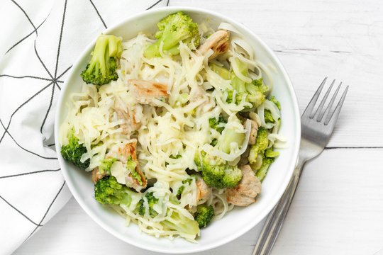 Rice Noodles With Broccoli And Chicken On Top. Top View.