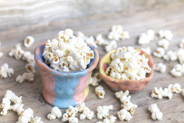 Homemade Kettle Corn Popcorn in unusual pottery pot on vintage w