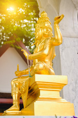 Statue of Hindu God Brahma in Thailand. Beautiful Indian religion traditional lord sculpture with for faces in a Public shrine