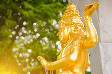 Statue of Hindu God Brahma in Thailand. Beautiful Indian religion traditional lord sculpture with...