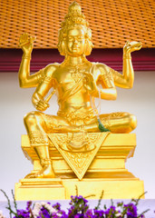 Statue of Hindu God Brahma in Thailand. Beautiful Indian religion traditional lord sculpture with...