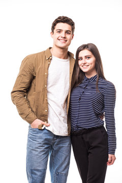 Portrait Of Young Couple Smiling On White Background